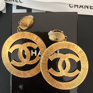 Chanel Vintage 1992 Gold Toned Jumbo Sunburst Textured CC Logo Dangling Earrings